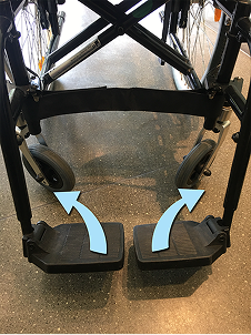 Fold up the footrests.
